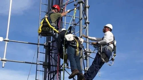 Tower installation field team reviewing site plans